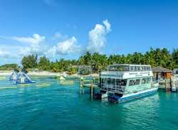 While visiting Blue Lagoon Island, one can experie While visiting Blue Lagoon Island, one can experience clear turquoise waters with a secluded lagoon and a number of coconut palm trees. The island has